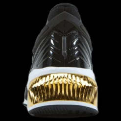 Puma Provoke Xt Ftr Moto Wn's Black- Team Gold Svart Outlet